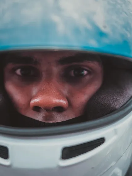 A powerful close-up of a driver's determined gaze.