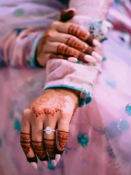 Another lovely shot from a wedding, focusing on the engagement ring and the beautiful henna stain.