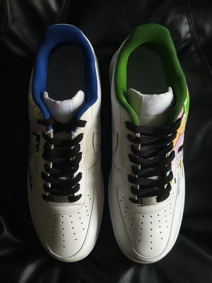 A top-down view of the One Piece custom sneakers, showing the different colored linings for each shoe.