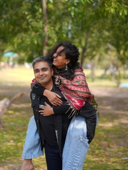 Fun and playful moments are a must. Our casual outfits were perfect for capturing these happy, candid shots during our pre-wedding shoot.