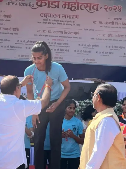 Celebrating our female champions. Here, one of my athletes receives her medal at the Maharashtra State Inter-University Athletics Championship. We are proud to coach and develop strong, successful female competitors.