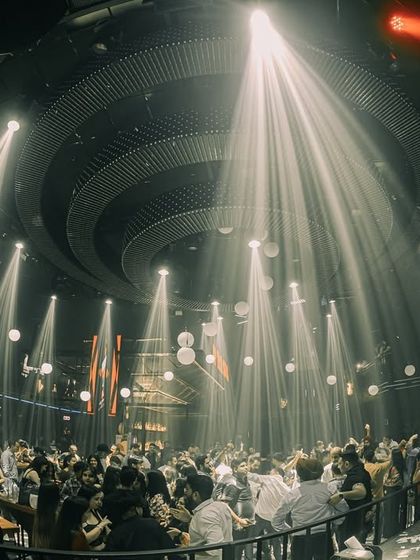 The architectural beauty of Prism Mohali, with spotlights creating a cathedral of light.