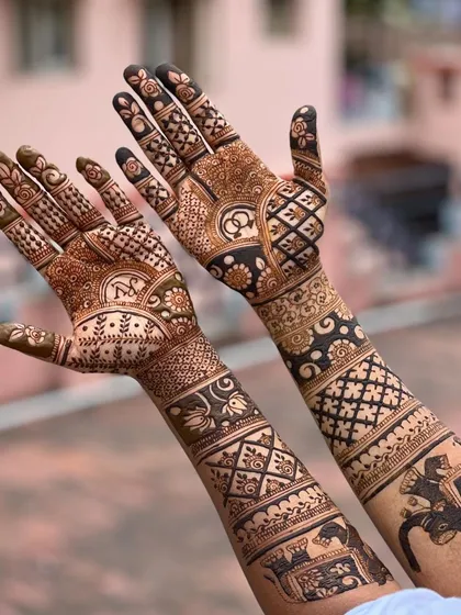 Another angle of the engagement mehendi, showing the personalized ring motif and initials.