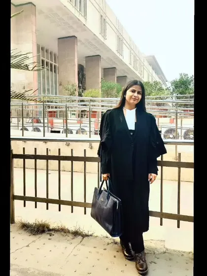 A photo outside the Delhi High Court. The lawyer's gown is more than just a uniform; it's a symbol of my responsibility to my clients and to the law.
