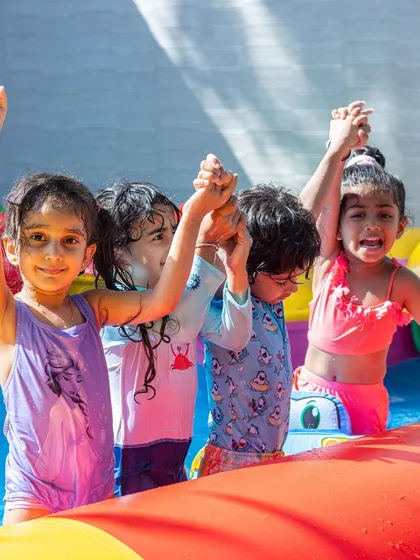 Friends that splash together, stay together. This photo captures a moment of pure joy and teamwork as the kids have a blast in the water at one of our pool parties.
