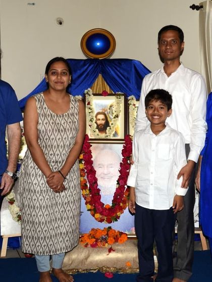 A family stands with our Nayaswamis for a photo after the discipleship ceremony. Our events are welcoming to all ages, and we cherish the opportunity to share this path with our loved ones.