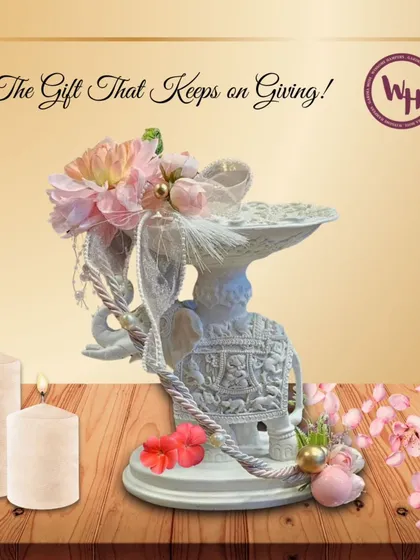 A gift that keeps on giving. This image showcases a beautiful and ornate decorative stand, perfect as a standalone gift or as the base for a luxurious custom hamper for a wedding or anniversary.