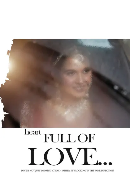 A creative and artistic portrait of the bride, seen through a car window, with the words "heart full of love".