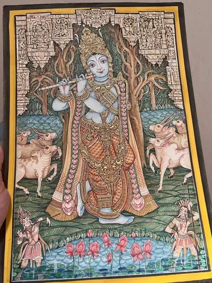 Krishna’s Serenade: Spreading joy with his flute and gentle cows in Mysore’s graceful palette. This piece showcases a unique composition and background.