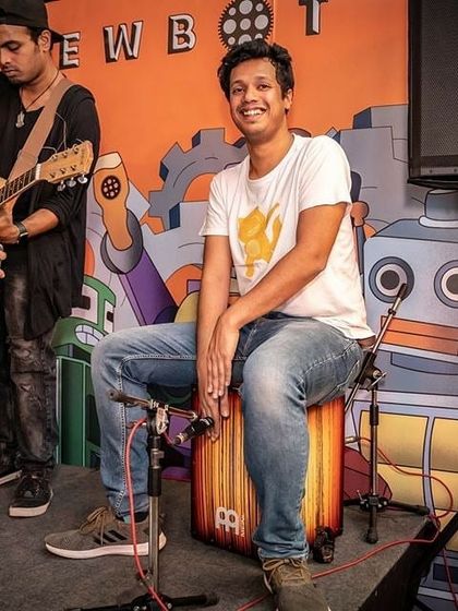 Taking a turn on the cajon at a public jam. It's always fun to collaborate and improvise with other musicians on the spot.