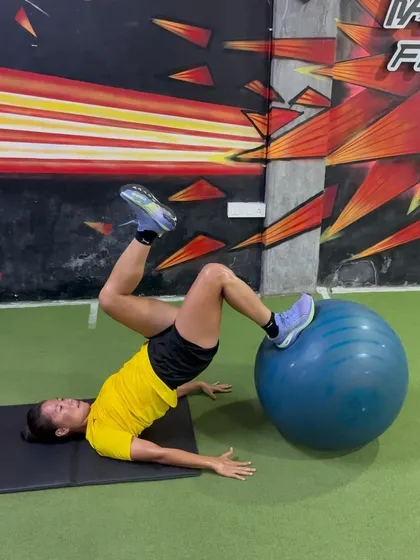 A single-leg eccentric bridge on a stability ball is an excellent exercise for improving hip stability and hamstring control through a full range of motion. The unstable surface adds a significant challenge to the stabilizing muscles.