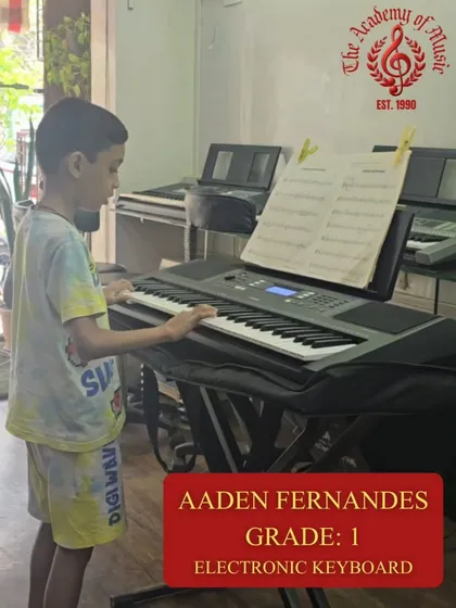 It's never too early to start a musical journey. We welcome young beginners like Aaden, seen here preparing for his Grade 1 electronic keyboard exam, providing a fun and structured environment for kids to discover their passion.