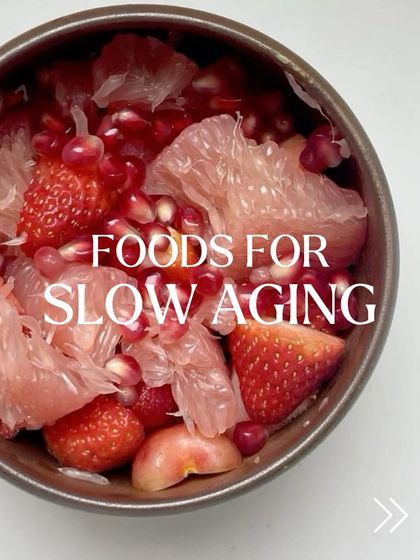 This beautiful bowl of fruit is an example of food for slow aging. Pomegranate and strawberries are packed with antioxidants that help you age gracefully from the inside out.