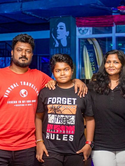 A family with their son posing for a picture. It's great to see families choosing my pub for their celebrations.