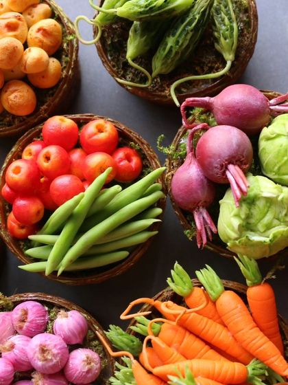 A close-up of my miniature vegetable baskets, showing the detail on the carrots and beets.