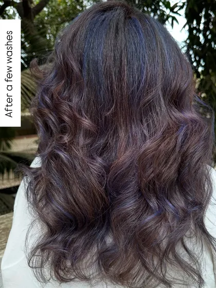 For my experimental clients like Bhakti, we love to play. This time we went for a cool purple and blue mix on her curly hair. The color looks so different after a few washes, fading into a beautiful pastel tone.