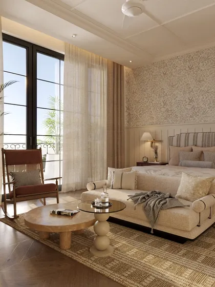 This bedroom, designed for a grandmother, is timeless and full of quiet nostalgia. The space features a classic bed, a comfortable lounge area, and a vintage-style rocking chair, all in a muted and elegant palette.