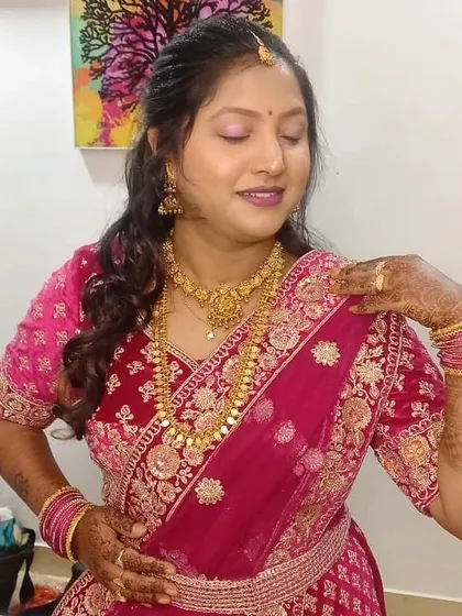 A close-up showing the soft, blended eyeshadow and glowing skin for Shwetha's party look.
