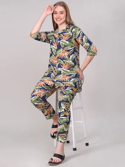 A seated, lifestyle pose in the same loungewear set. This adds variety to the product gallery and shows how the garment looks in a more relaxed posture.