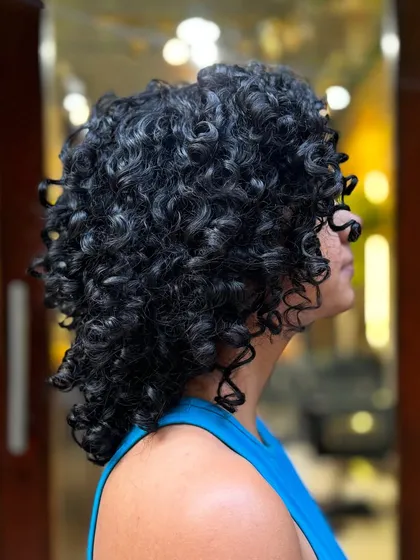 More examples of my short curly haircuts, from bobs to layered chops, each one personalized to the client's curl pattern and face shape.