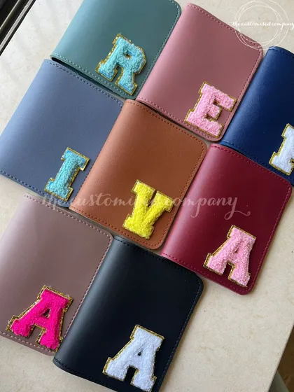 A passport cover as unique as their adventures. We offer a wide range of colorful leatherette passport holders that can be personalized with chenille initial patches.
