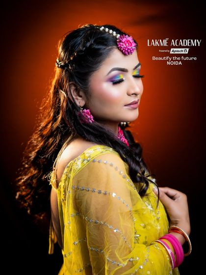 A vibrant Haldi look with colorful analogous eye makeup. This demonstrates how to play with bright colors for pre-wedding events while keeping the overall look fresh and celebratory.