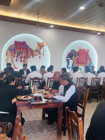 A wider view of the lunch get together. Breaking bread together strengthens our bonds as a legal family.