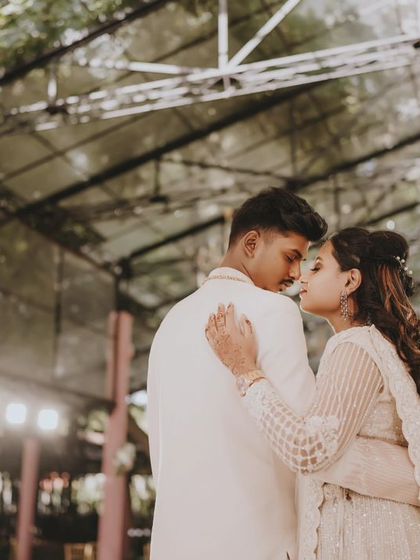 A candid and romantic shot of the couple from their engagement shoot.