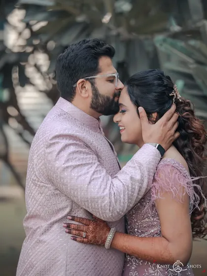 A tender forehead kiss. This is one of my favorite shots to capture, as it's full of affection and care.