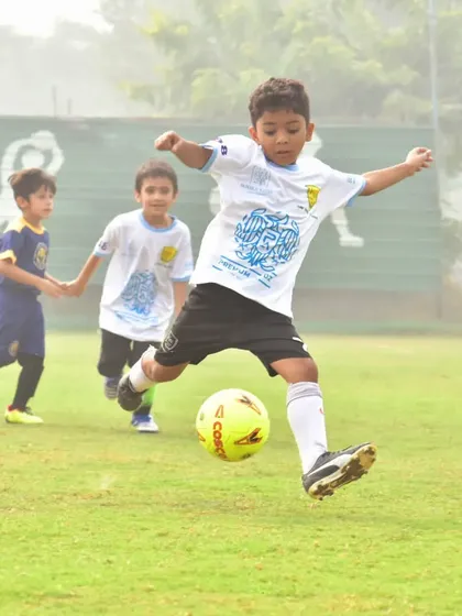 A powerful shot on goal during the Premium Autoz FD Golden Baby League. We encourage our players to be confident and take their chances.