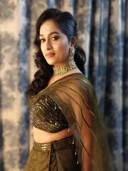 Another angle of this beautiful engagement look. The soft curls and glowing makeup create a look that is both sophisticated and effortlessly glamorous.