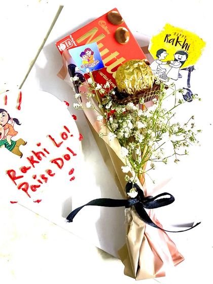 A closer look at our fun "Rakhi Lo, Paise Do" hamper, perfect for the sibling bond.