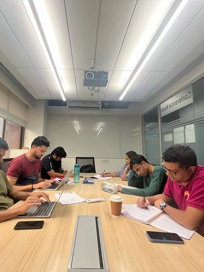 The Gorillas in session. A candid shot of our writers focused on their laptops and notebooks during an in-person workshop.