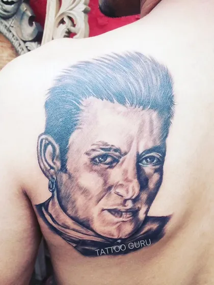 Celebrity portraits are a popular request. This is a portrait tattoo of Salman Khan, where the focus is on capturing iconic features and expressions that are instantly recognizable.
