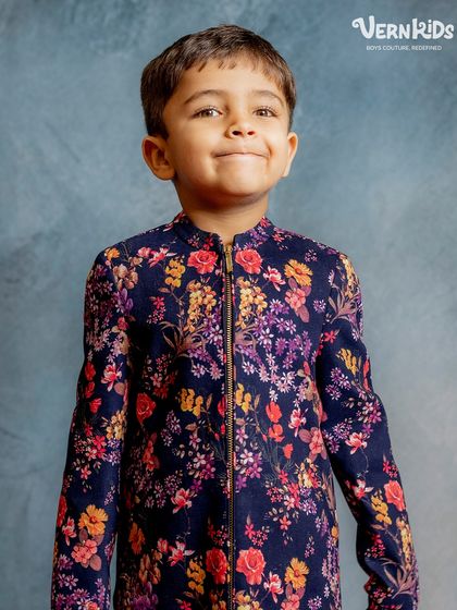 That happy smile says it all. He loves his floral bomber, and we love seeing him shine in it. It’s a versatile piece for any stylish boy's wardrobe.