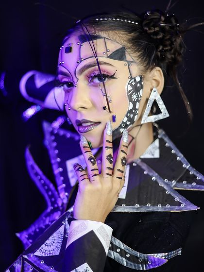 Another angle of the geometric look, showing the detailed nail art.