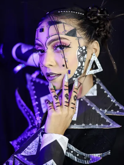 Another angle of the geometric look, showing the detailed nail art.