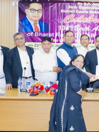 Presenting a memento during the Dr. B. R. Ambedkar anniversary function, an event organized in collaboration with the RCBA Executive Committee.