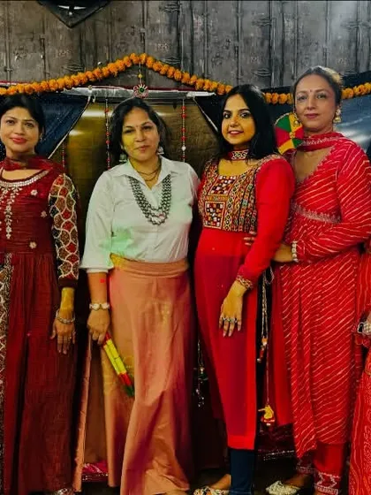 A group of friends posing together during the Navratri event. Our studio is a place where friendships blossom.