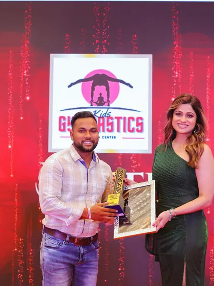 I was honored to receive the Sahika India International Excellence Award from actress Shamita Shetty. This recognition for our Kids Gymnastics & Yoga Center inspires me to keep pushing my students to achieve greatness.