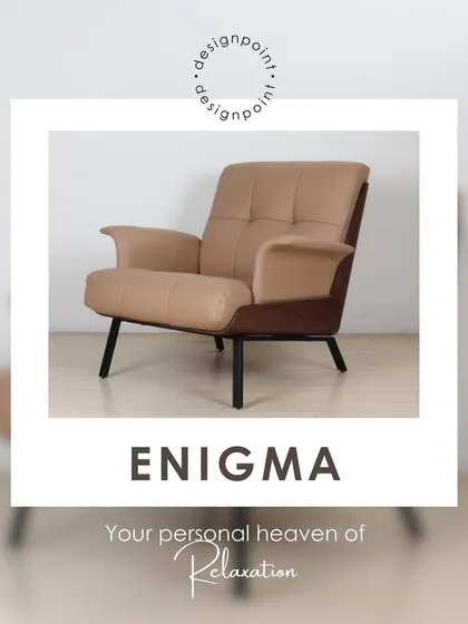 Meet the 'Enigma' lounge chair. This piece features a unique two-part design with a solid wood external frame and plush, tufted beige upholstery, offering a blend of sharp lines and soft comfort.