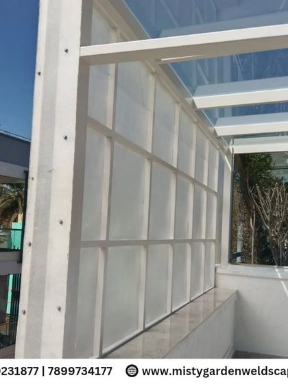 This image highlights the embossed sheet side covering added to the glass pergola, which provides extra privacy and protection from wind.