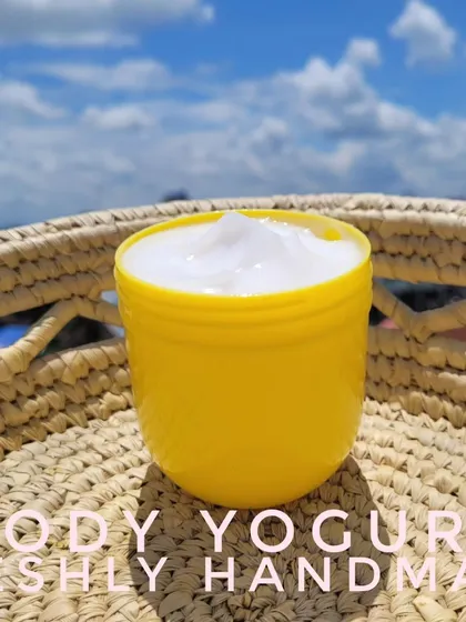 My Body Yogurt pictured against a beautiful blue sky. It’s the perfect lightweight moisturizer with SPF to protect your skin while you are out and about.
