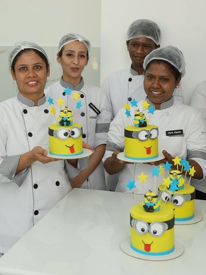 More happy faces from our Minion cake module. Learning to create themed cakes like this is a valuable skill for any home baker looking to attract customers for children's parties.