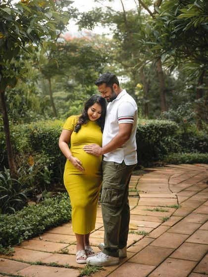 A quiet moment shared between parents-to-be on a garden path. I love finding these peaceful spots during an outdoor session to capture the deep connection and anticipation.