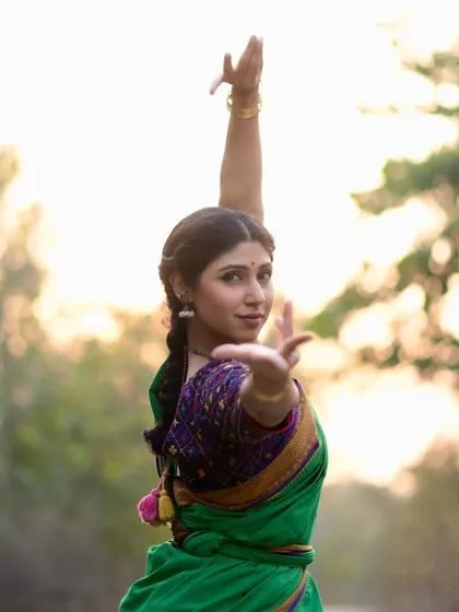 For me, dance is a path of inquiry, much like the one in Robert Frost's poem. This portrait, taken in a quiet wood, reflects the introspective journey of being a classical dancer and choosing a life dedicated to art.