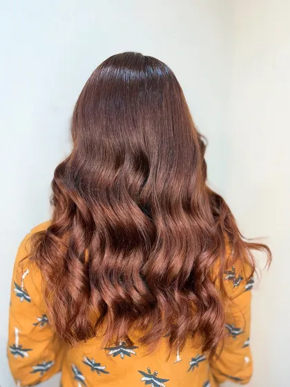 The full view of this effortlessly luxe chocolate brown hair. It's a rich and dimensional color.