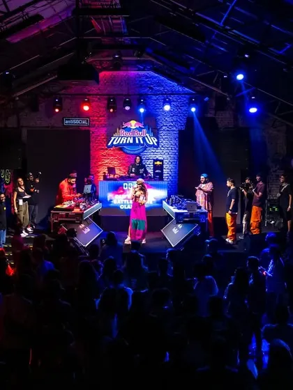The full view of the Red Bull 'Turn It Up' stage. The energy was insane with a packed house and multiple performers.
