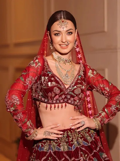 A happy bride ready for her big day. The styling combines traditional elements with a modern fit for a comfortable yet stunning look.
