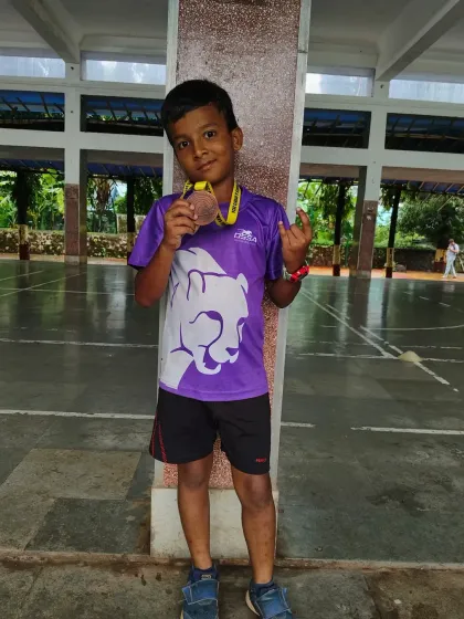 A young champion from our academy with his bronze medal from the 100m race at the CISCE zonal athletic championship.